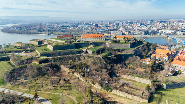 Aerial view of the majestic Petrovaradin Fortress standing proudly above the Danube, its ancient walls a testament to time, Petrovaradin, Vojvodina, Serbia.