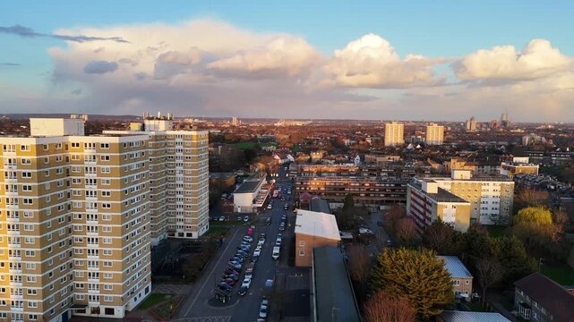An aerial clip of a London suburb with different types of building structures.