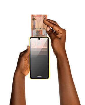 Hands hold a smartphone as a 200 Gambian Dalasi note is inserted into the top, like a card reader. It illustrates mobile banking, digital payments, or depositing cash into a digital wallet.