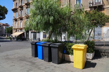 Municipal garbage recycling bins in Catania city on Sicily island, Italy.