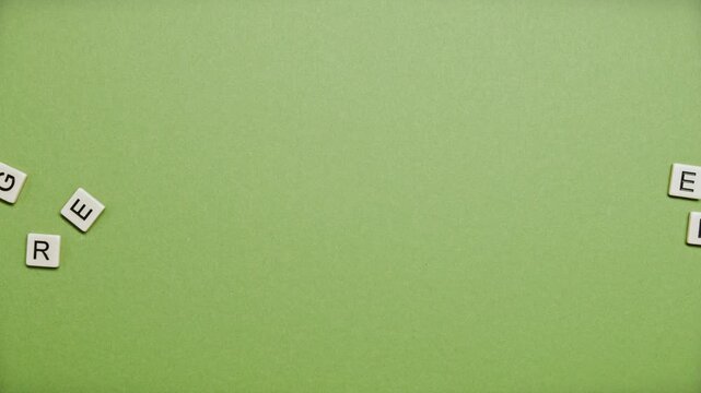 A vintage green and white paper texture features a seamless grunge pattern on a blank canvas material to create a light textured backdrop for art and wall design