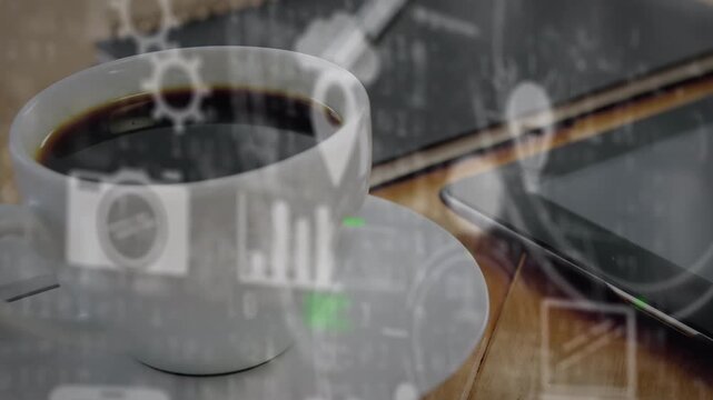 Animation of icons and data processing over notebook, tablet and coffee on desk