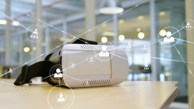 A virtual reality headset on a table in an office