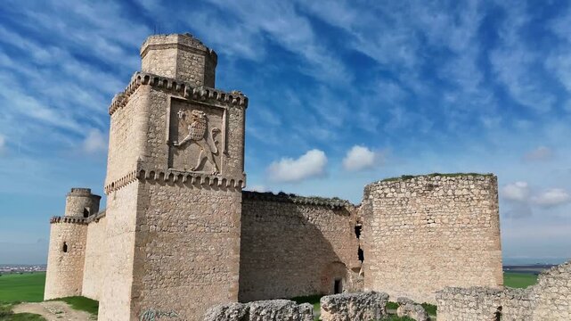 Aerial drone shot approaching the medieval Castle of Barcience historic fortress in Toledo province Spain