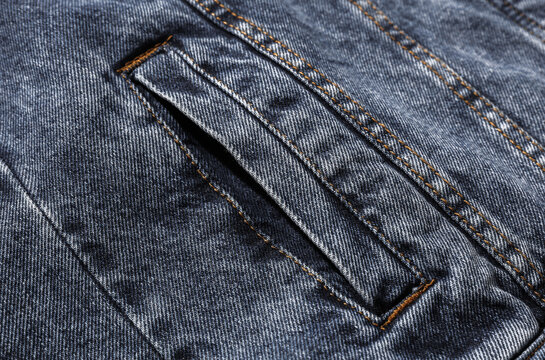 Back Pocket of a denim jacket close-up