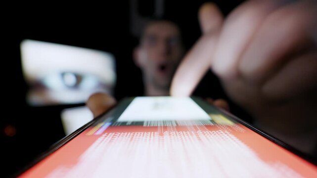 Man finger rapidly scrolls through a social media feed on a smartphone screen. Unique point-of-view shot from the phone captures the speed of information overload.