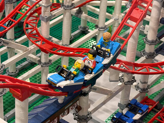 Naklejka premium Lego roller coaster car with three minifigures