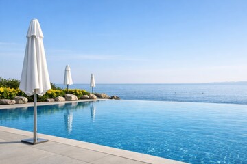 Obraz premium Infinity pool by the beach with closed umbrellas and clear blue sky concept. Ai generative