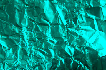 Obraz premium Turquoise Crumpled Foil Texture Background Metallic Wrinkled Aluminium Surface Abstract Shiny Material