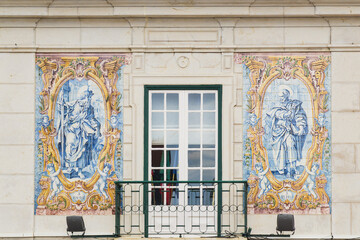 Close up traditional Azulejos Tiled panels on building facade. Cascais, Portugal
