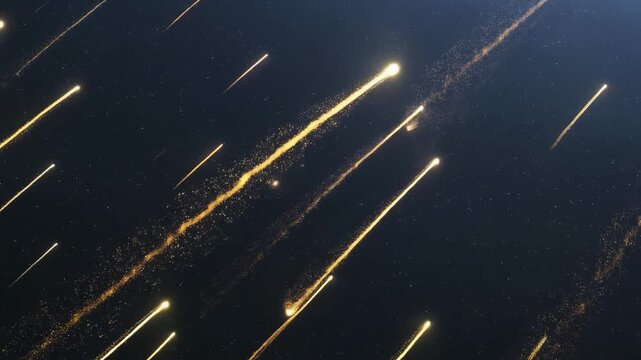 暗い星空の背景を横切り光る粒子の軌跡を残す複数の隕石
