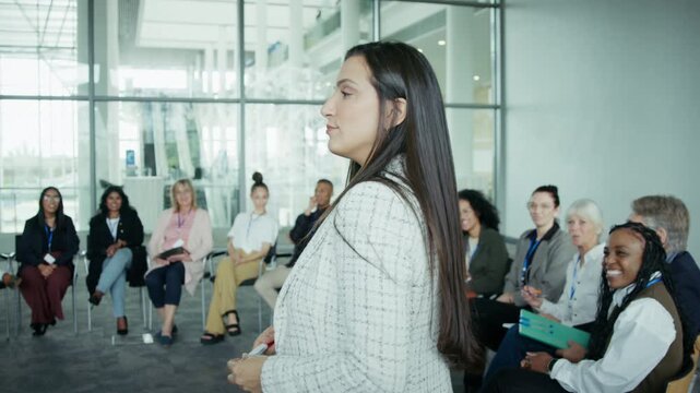 Speaker addressing business group meeting