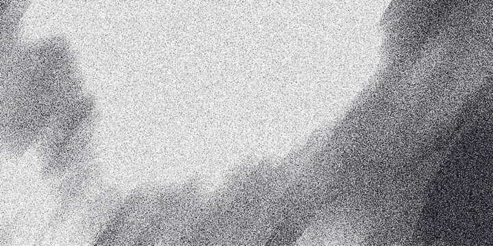 Abstract monochrome background with soft, diffused dark shapes against a speckled light gray field, evoking a sense of fog or mist