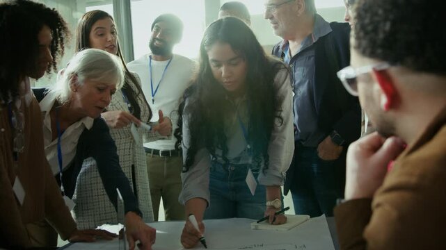 Professionals collaborate during a business meeting