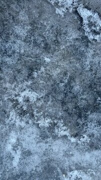 Minimalist blue ice and frost texture. Abstract winter background for graphic design, web or overlay. Natural frozen crystalline patterns with plenty of copy space for creative projects.