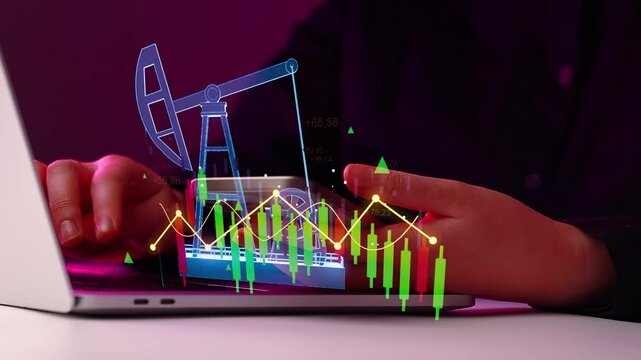 Market analysis shows oil prices on laptop with digital graph and colorful candlestick indicators in a dark room.