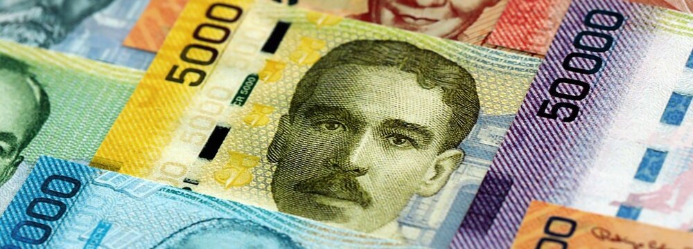 Costa Rican old and new colon money bills pile on table. Costa Rica banknotes of CRC currency close up. Concept of business, economy and banking in Costa Rica