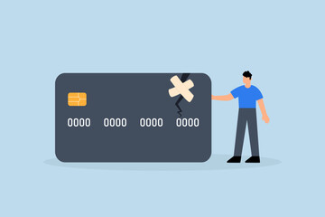 Credit repair, Confident businessman stands with credit card fixed and repaired wrapped in bandage © dwara
