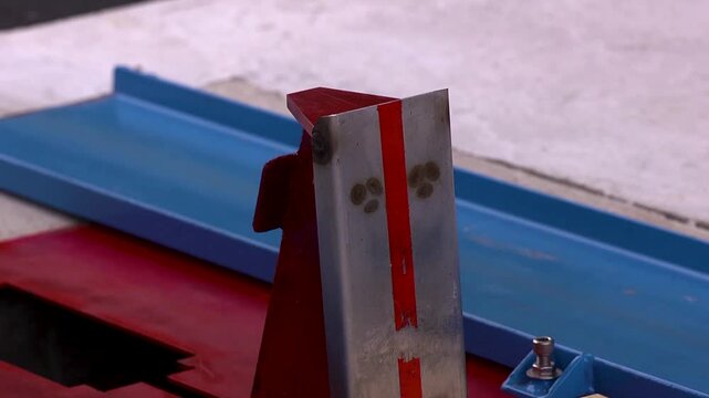 Hydraulic brake stopping soap box cars in the gate