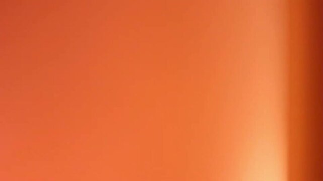 Vibrant Warm Light Leak Motion Graphic - Abstract Orange and Red Flare Overlay