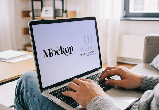 Laptop Mockup Of Man Using Notebook At Home On Sofa