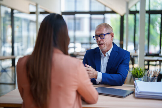 Business people discussing during corporate meeting in office