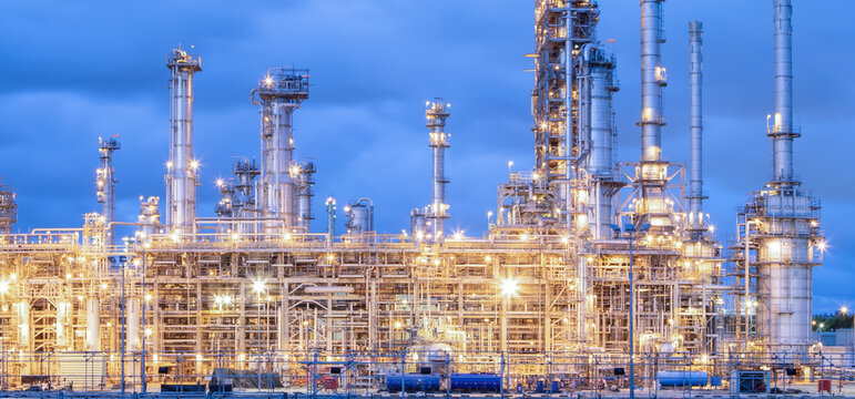 Oil and Gas Industrial zone,The equipment of oil refining,Close-up of industrial pipelines of an oil-refinery plant,Detail of oil pipeline with valves in large oil refinery.