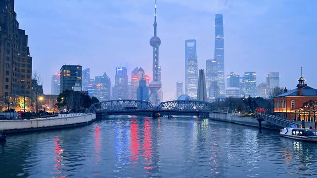 Shanghai skyline with Oriental Pearl Tower and Lujiazui financial district during sunrise and sunset, China. February 15, 2026
