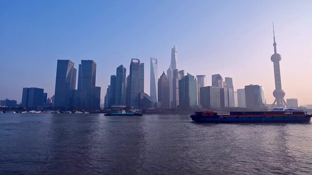 Shanghai skyline with Oriental Pearl Tower and Lujiazui financial district during sunrise and sunset, China. February 15, 2026