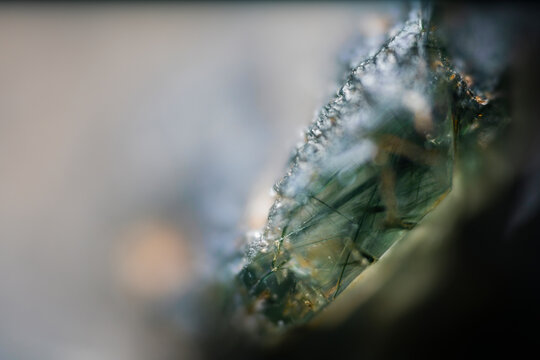 Macro image of prase green translucent quartz with actinolite needle inclusions from Sinyaya Rechka, Primorye, via microscope, 10x magnification, 3.6mm field of view
