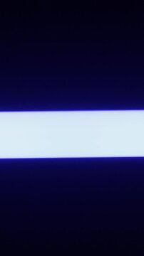 A horizontal neon light beam moves vertically up the screen changing colors against deep darkness. Concept of digital scanning, futuristic technology, and loading data progress.