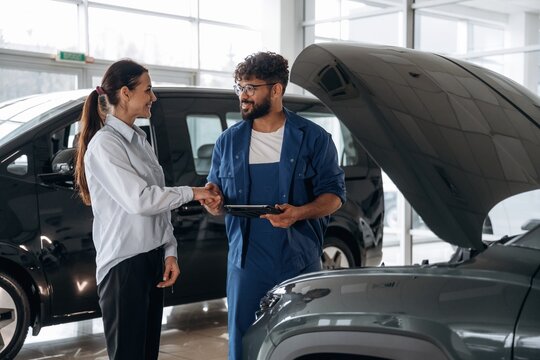 Technical inspection explained to customer indoors