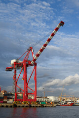 Fototapeta premium A large, ship-to-shore (STS) or quay crane in the Port of Lisbon, Portugal., used to load and unload shipping containers.