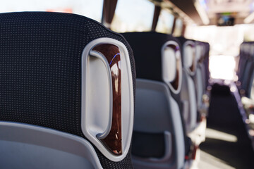 Interior view of bus seats showing design and layout during travel time © Maria