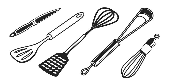 A variety of kitchen utensils including whisks and spatulas for cooking and baking