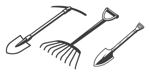 A variety of gardening tools including a spade, rake, and shovel © Mamun