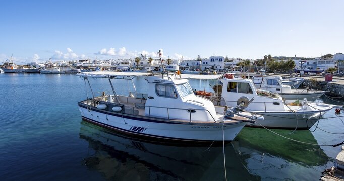 Fishing boats in Naoussa harbour, White Cycladic houses, Naoussa, Paros, Cyclades, Greece