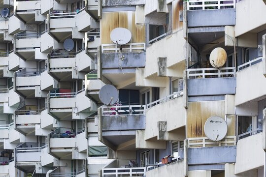High-rise residential building with balconies and satellite dishes, Trabantenstadt Chorweiler in Cologne, North Rhine-Westphalia, Germany