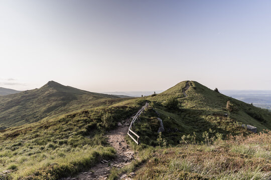 Bieszczady Mountains trekking trail panorama during golden hour
