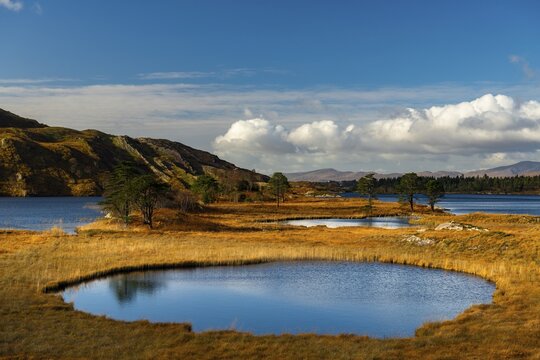 Lough Cloonee with cloudy sky in autumn landscape, Kenmare, County Kerry, Ireland