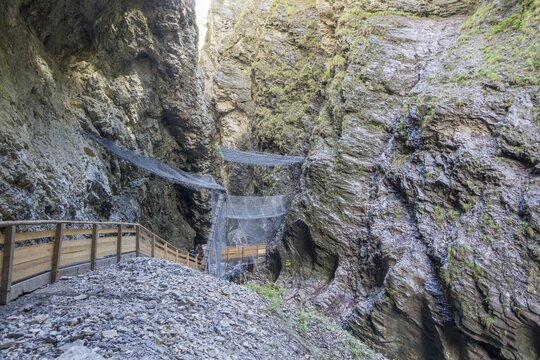 Path construction in the Liechtensteinklamm gorge with protective nets against rockfall, Sankt Veit im Pongau, Salzburg, Austria