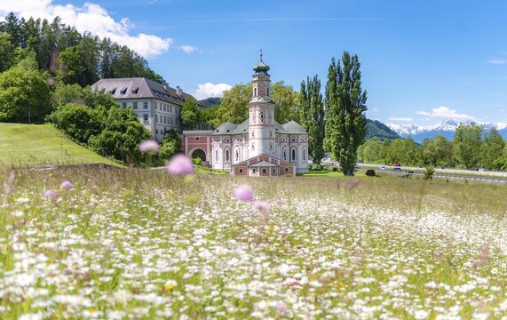 Flower meadow in front of the monastery St. Karl, St. Charles's Church, monastery church St. Karl Borrom&auml;us, Rokoko, Volders, Tyrol, Austria