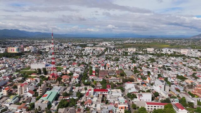 Aerial view of Phan Thiet city with coastal urban area and beachfront, scenic seaside town landscape in Vietnam