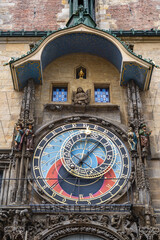 Obraz premium Prague Astronomical Clock Orloj on Old Town City Hall in Prague. Close view of the medieval clock face showing time, date, astronomical symbols, and zodiac signs.