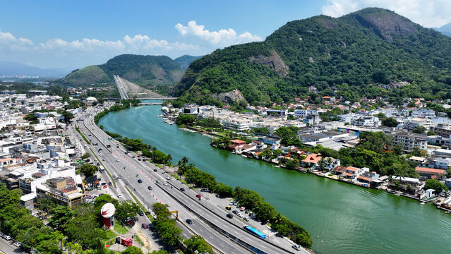 Highway Road In Barra Da Tijuca Rio De Janeiro Brazil. Bird Eye View Of A Amazing Coastal Beach In The Summer Holiday. Shore Sky Clouds Beach Sea. Outdoor Beach Panning Wide.