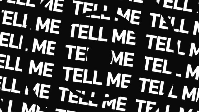Concentric circles rotate in opposite directions displaying the phrase tell me repeated along circular paths surrounding a center space with continuous word movement.