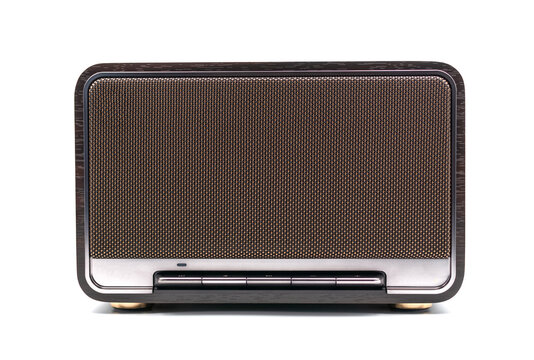 Retro style wireless Bluetooth speaker with wood finish on white background