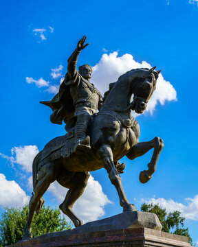 Tashkent, Uzbekistan - September 29, 2023: Monument Amir Timur or Tamerlane on a sunny day with cloudy sky.