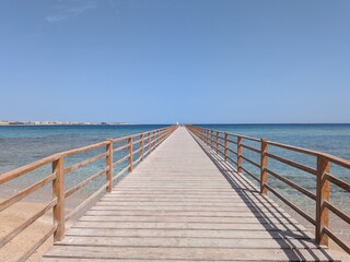 Fototapeta premium wooden bridge over the sea Sahl Hasheesh Red Sea Egypt