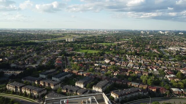 Aerial view of downtown Mississauga, Ontario, Canada. Including the landmark Absolute buildings, Square One Shopping Center, Hurontario Street and Highway 403 on a beautiful summer late afternoon.